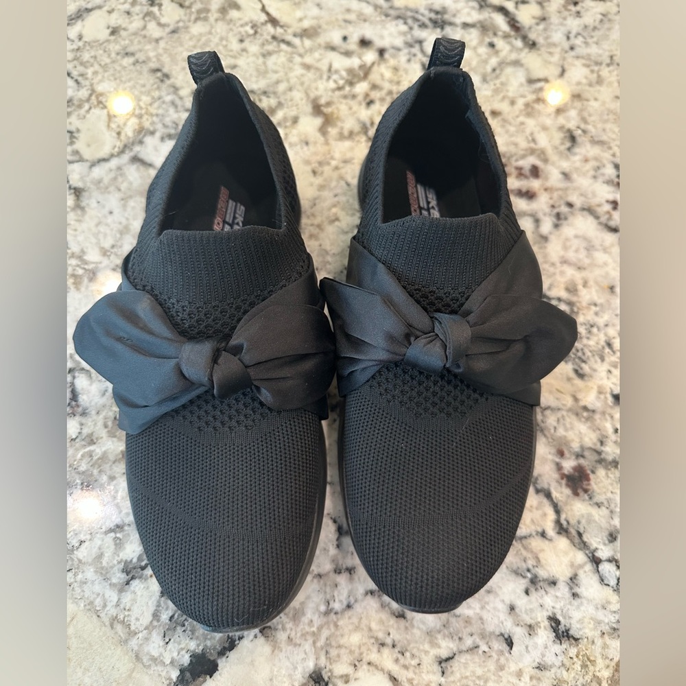 Sketchers slip on memory foam runners.